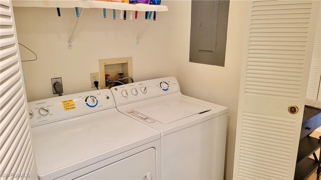 2121 Collier Ave Unit 405, Fort Myers, FL 33901 - clothes washing area with washing machine and clothes dryer, laundry area, and electric panel