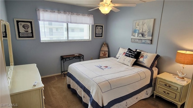 2121 Collier Ave Unit 405, Fort Myers, FL 33901 - bedroom featuring baseboards, dark colored carpet, and ceiling fan