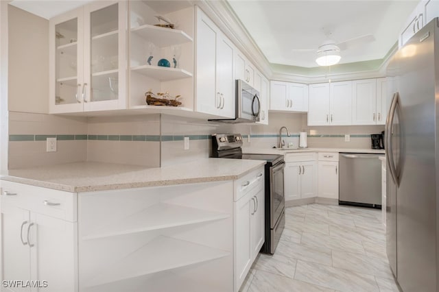 kitchen with white cabinetry, open shelves, marble finish floor, and appliances with stainless steel finishes