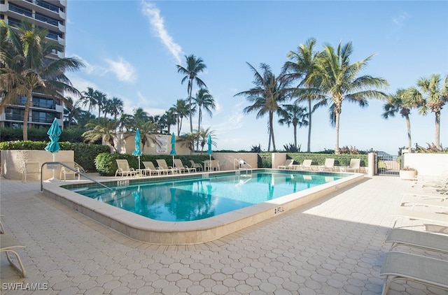 pool with a patio area