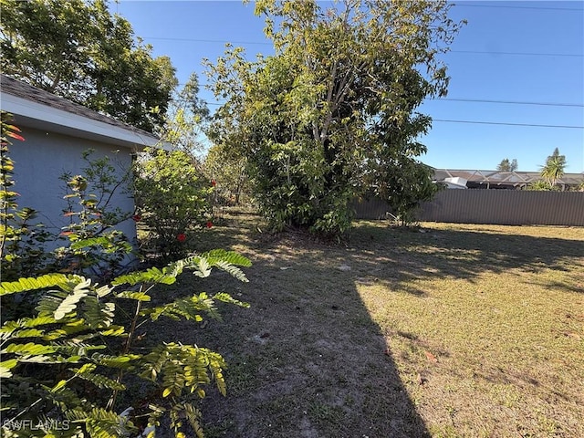 view of yard featuring fence