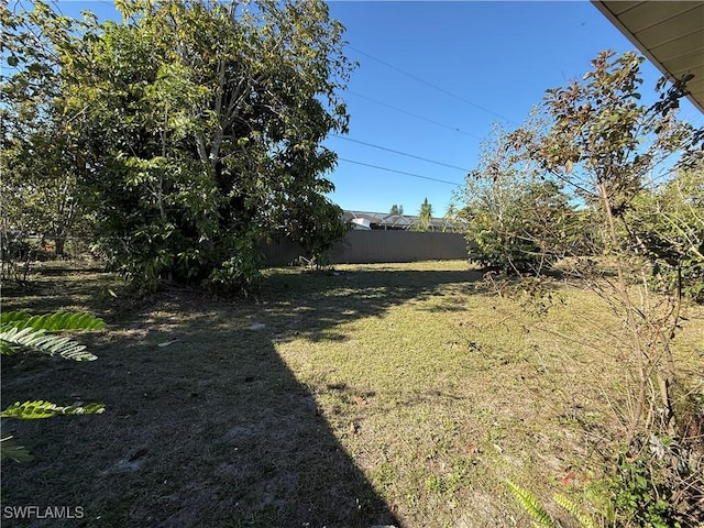 view of yard with fence