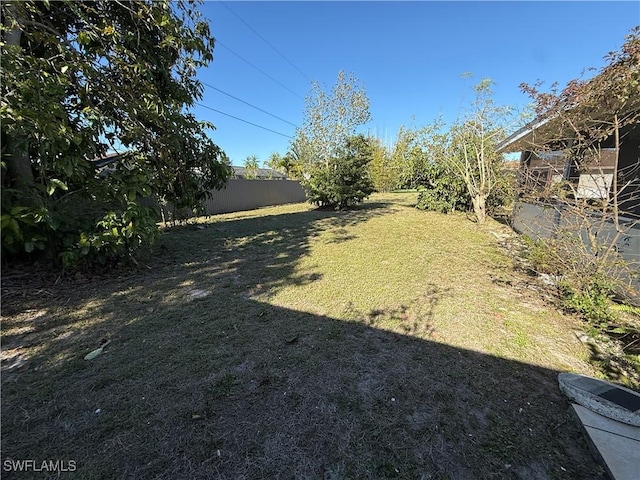 view of yard with fence