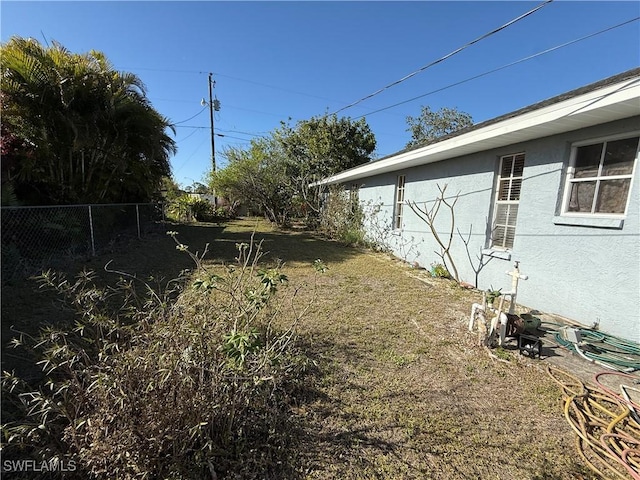 view of yard featuring fence