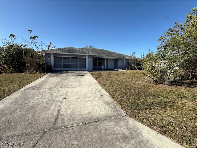 ranch-style house with a front yard, concrete driveway, an attached garage, and stucco siding