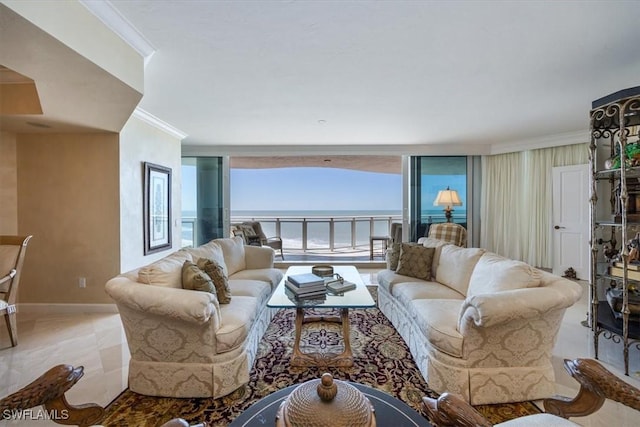 living area with crown molding, baseboards, and a water view