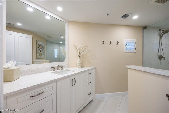 full bathroom with recessed lighting, a walk in shower, and visible vents