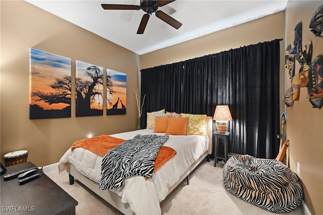 bedroom with carpet flooring, baseboards, and ceiling fan