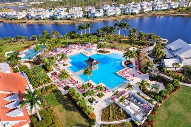 aerial view with a residential view and a water view