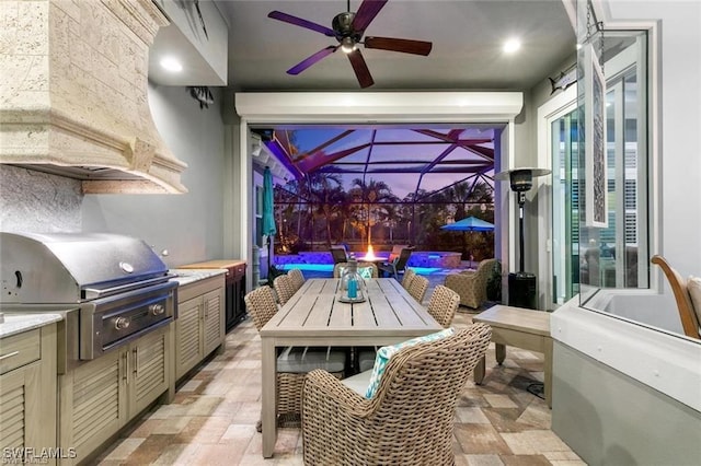 view of patio / terrace featuring area for grilling and ceiling fan