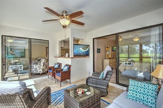 tiled living area with a textured ceiling