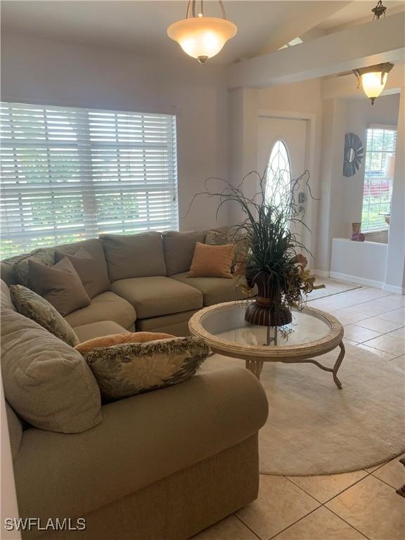 living room featuring light tile patterned floors