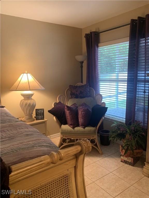 bedroom featuring light tile patterned floors