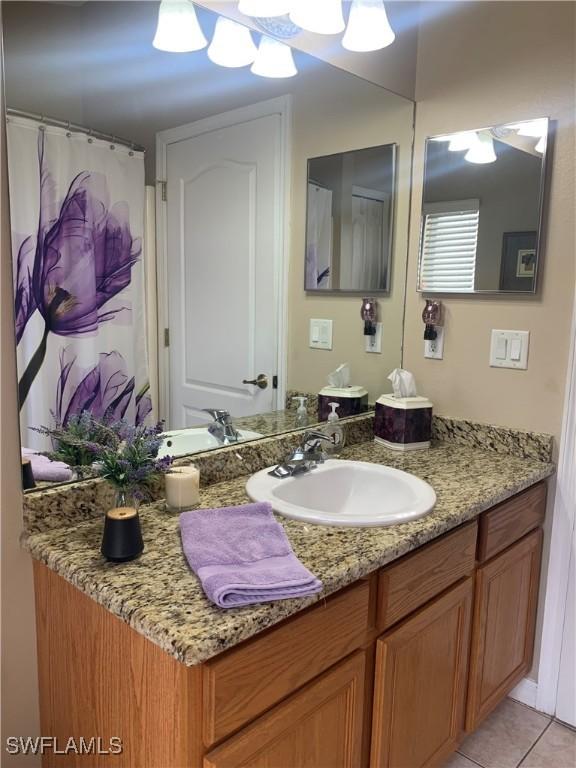 bathroom featuring vanity and tile patterned floors