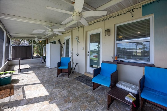 view of patio with a ceiling fan