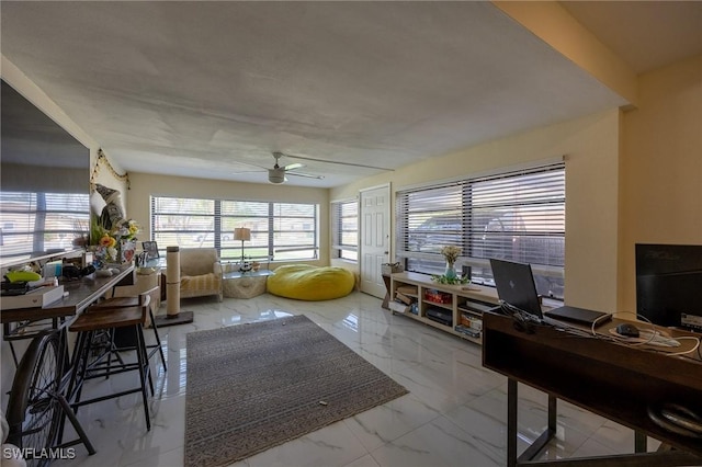 office with marble finish floor and ceiling fan