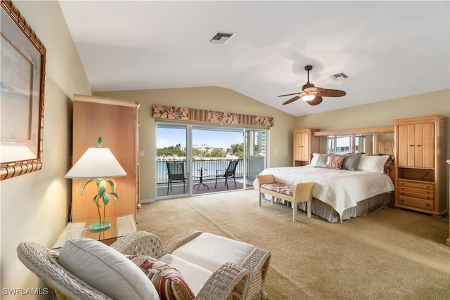 bedroom with access to exterior, visible vents, light colored carpet, and vaulted ceiling