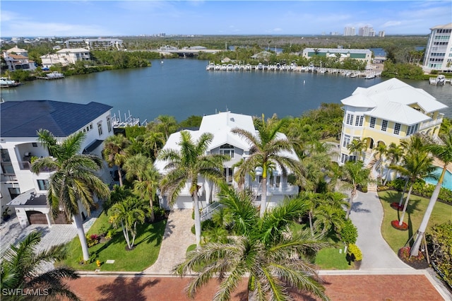 birds eye view of property featuring a water view