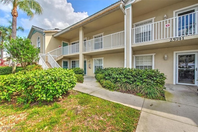 25741 Lake Amelia Way Unit 202, Bonita Springs, FL 34135 - view of building exterior