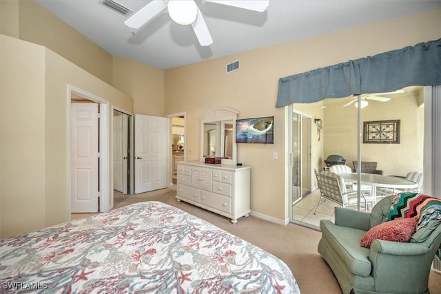 bedroom featuring light carpet, ceiling fan, and visible vents