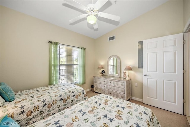 bedroom featuring visible vents, vaulted ceiling, light carpet, and baseboards