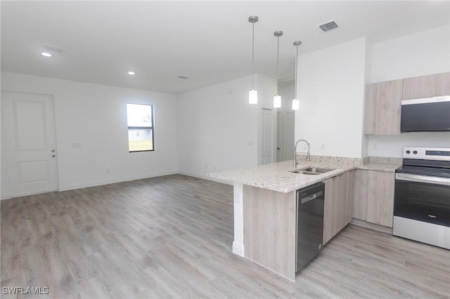 kitchen featuring visible vents, light brown cabinetry, stainless steel electric stove, dishwashing machine, and modern cabinets