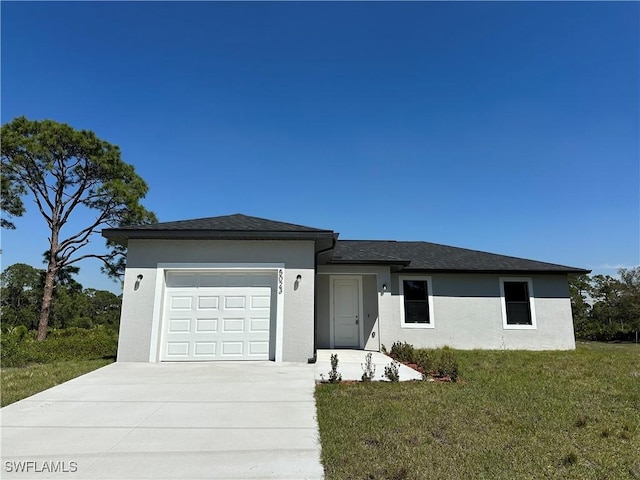 view of front facade featuring stucco siding, an attached garage, concrete driveway, and a front lawn