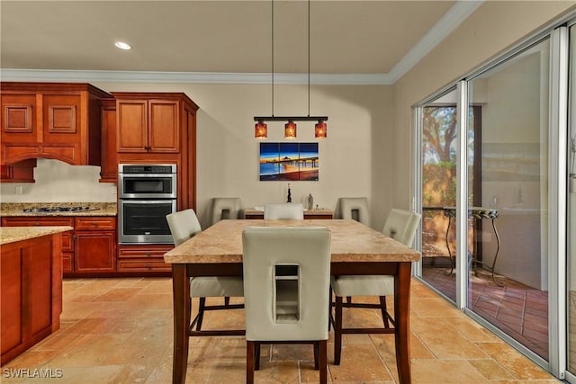 dining area with recessed lighting, stone finish flooring, and crown molding