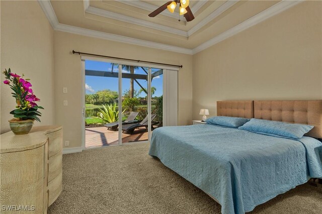 carpeted bedroom with access to exterior, a raised ceiling, ornamental molding, and ceiling fan