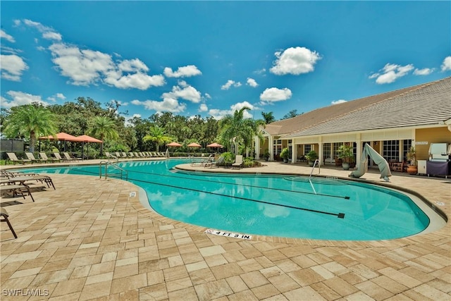 community pool with a patio