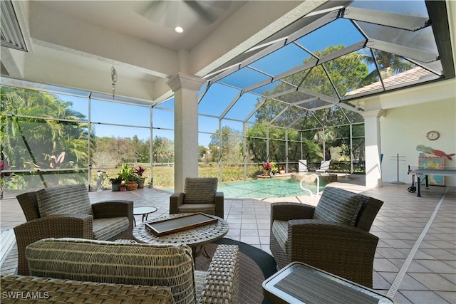 view of patio with an outdoor living space, an outdoor pool, and a lanai