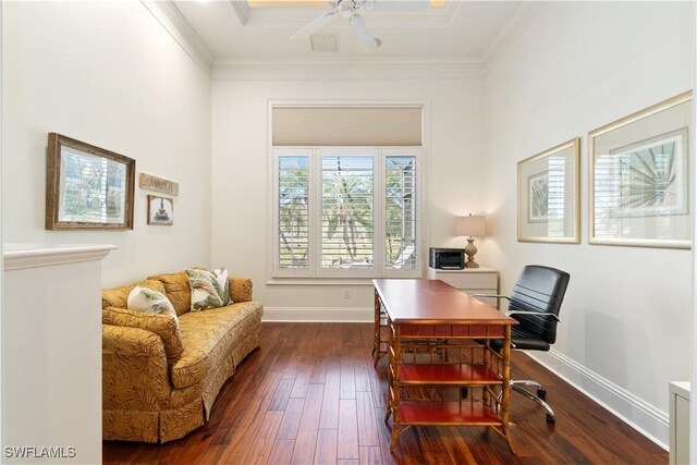 office with dark wood finished floors, crown molding, and baseboards