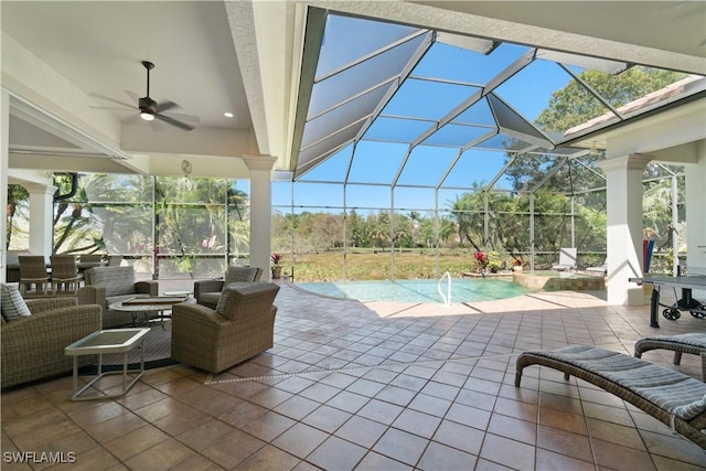 view of patio featuring an outdoor living space, glass enclosure, an outdoor pool, and ceiling fan