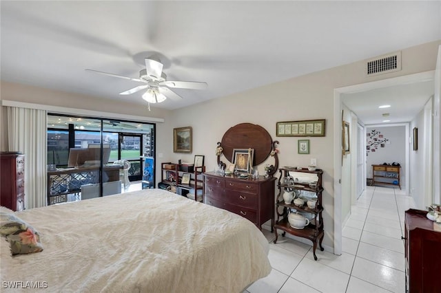 bedroom featuring light tile patterned floors, ceiling fan, visible vents, baseboards, and access to outside