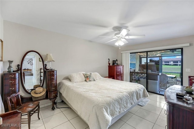 bedroom with light tile patterned floors, access to outside, and a ceiling fan