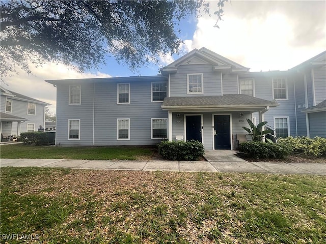 view of front of home with a front lawn