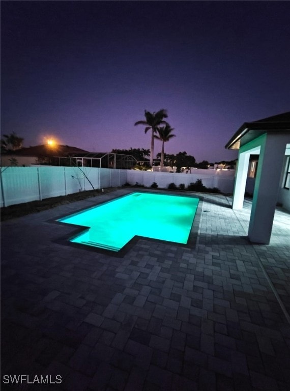 view of pool featuring a fenced in pool, a fenced backyard, and a patio