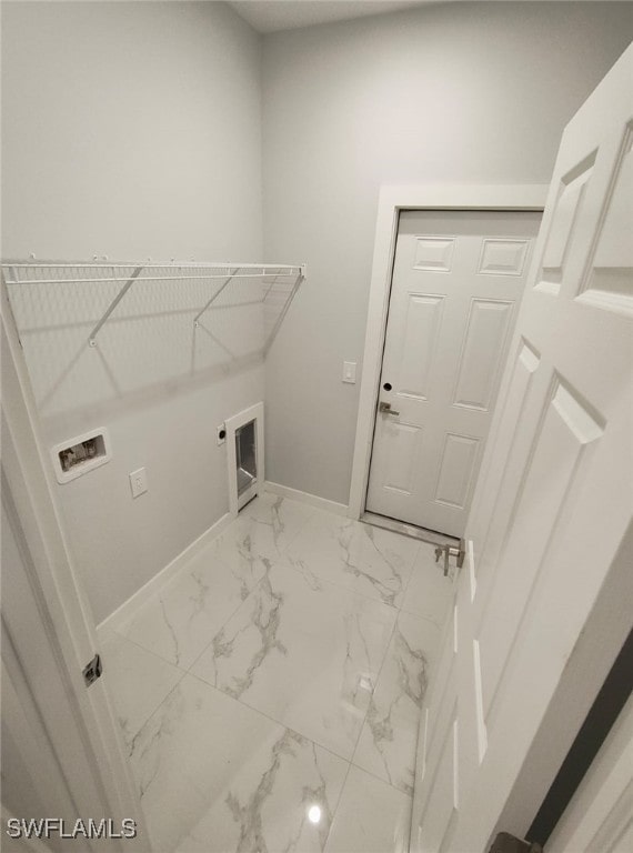 laundry area featuring marble finish floor, hookup for a washing machine, hookup for an electric dryer, laundry area, and baseboards