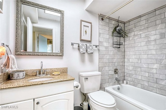 full bath featuring toilet, shower / bathing tub combination, and vanity