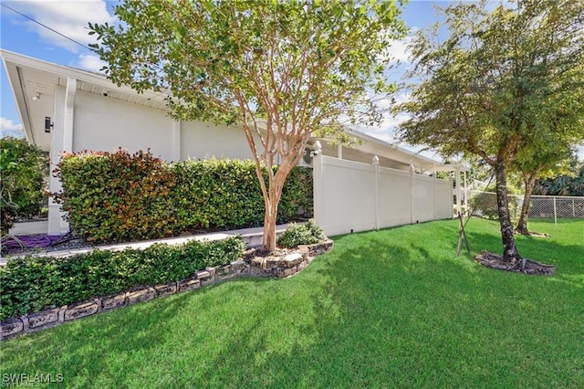 view of yard with fence