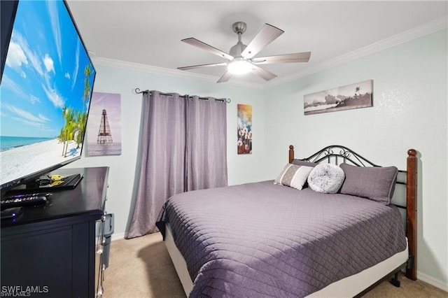 bedroom featuring carpet floors, crown molding, baseboards, and ceiling fan