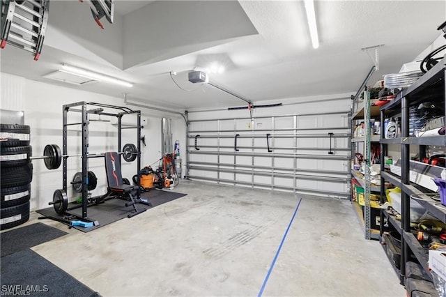 garage featuring a garage door opener