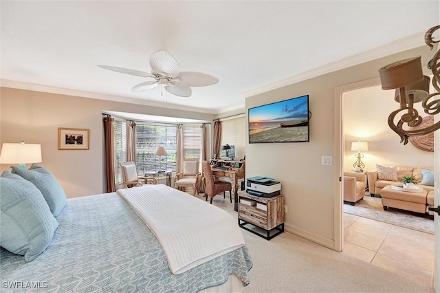 bedroom with light tile patterned floors, light colored carpet, a ceiling fan, baseboards, and ornamental molding