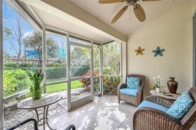 sunroom with vaulted ceiling and ceiling fan