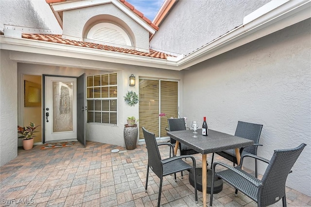 view of patio featuring outdoor dining space