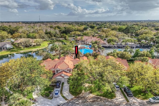 drone / aerial view with a water view