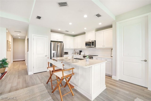 kitchen featuring a sink, visible vents, and appliances with stainless steel finishes