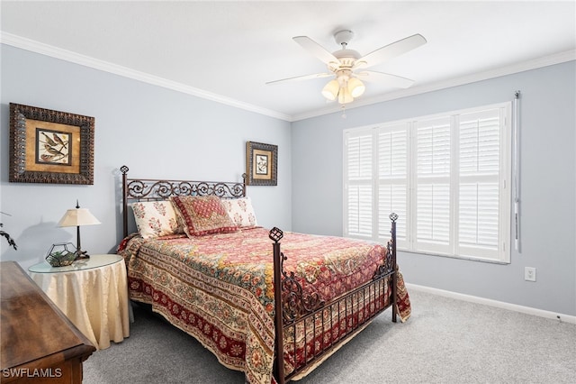 carpeted bedroom featuring crown molding, baseboards, and ceiling fan