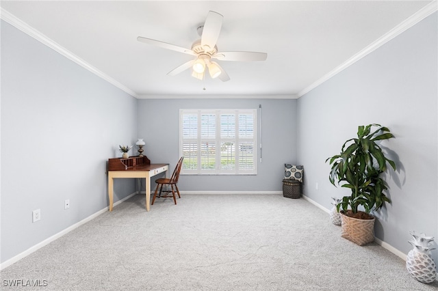 carpeted home office featuring crown molding, baseboards, and ceiling fan