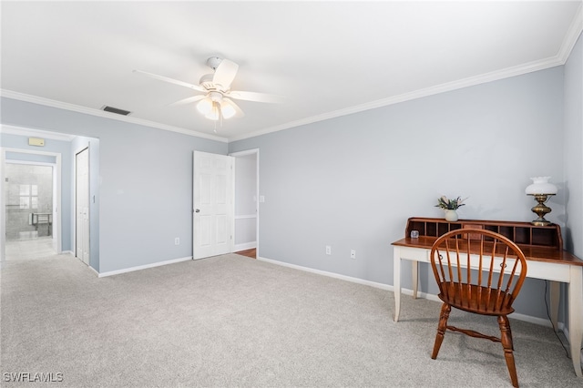 office space featuring baseboards, visible vents, a ceiling fan, crown molding, and carpet floors